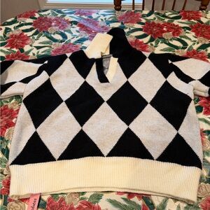 Chic Argyle Turtleneck Sweater in Black and Cream